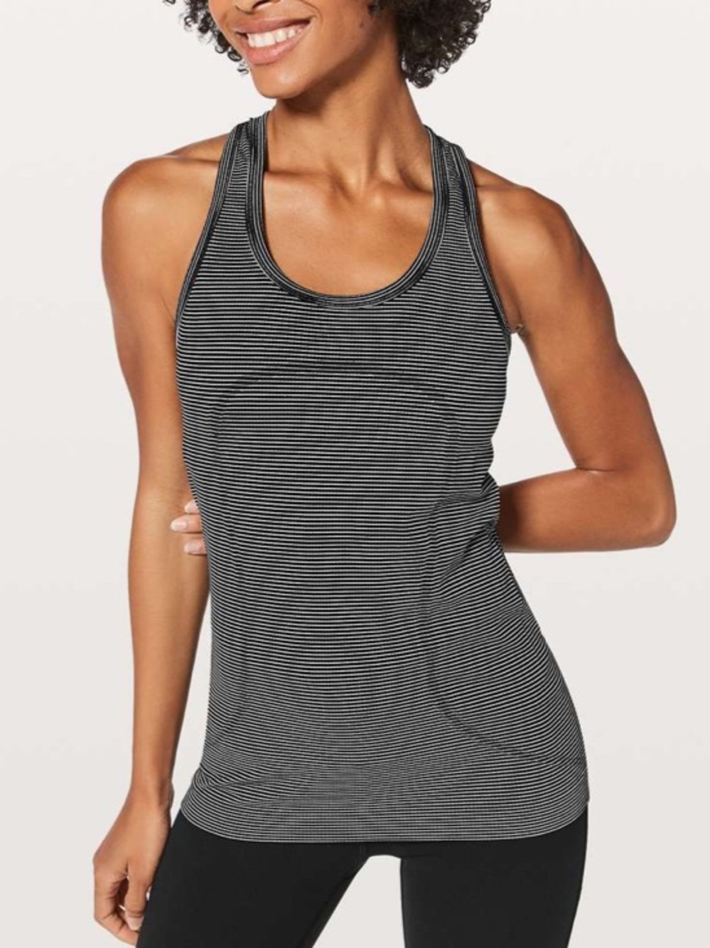 Black and white Lululemon swiftly tech striped tank top